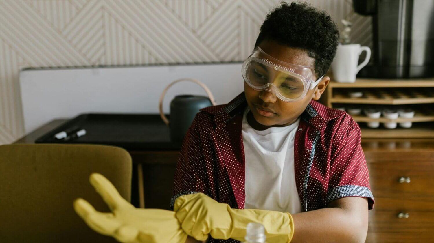 Teenage boy preparing for science experiment in homschool