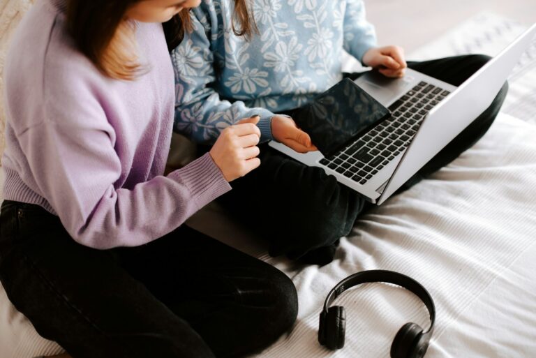 Students working together on a laptop
